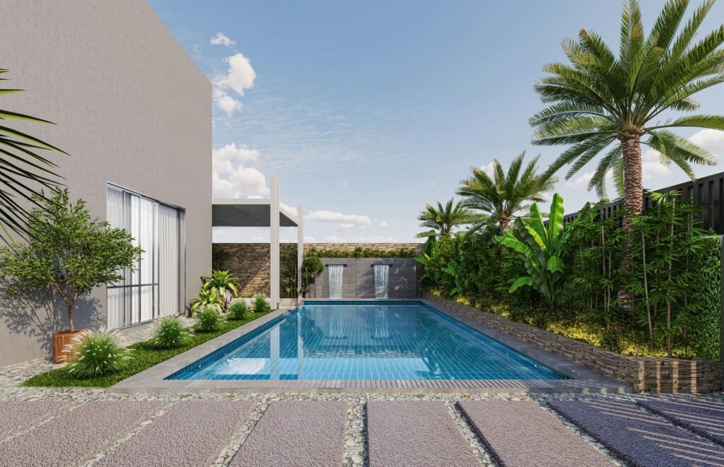 Stunning luxury pool area with tropical plants in a modern Dubai villa.